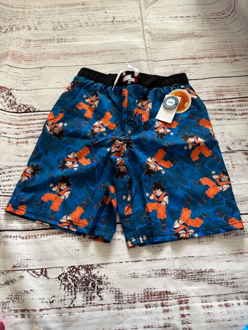 Kids Blue & Orange Swim Trunks with Character Print